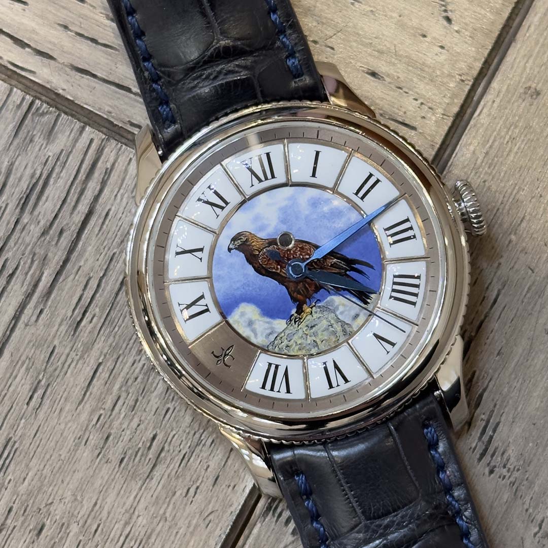 Julien Coudray Manufactura 1528 L’Aigle Royal in solid PT950 platinum. Unique piece featuring grand feu enamel, Petitot point by point technique and patented in-house movement.