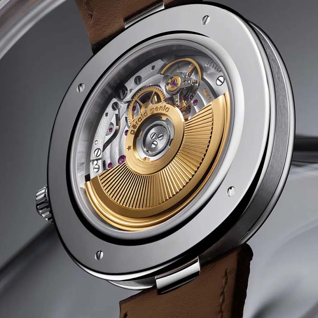 The Gerald Genta Genève Grafite pairs a white gold cushion case with a textured silver dial and warm rose gold details for refined everyday elegance.