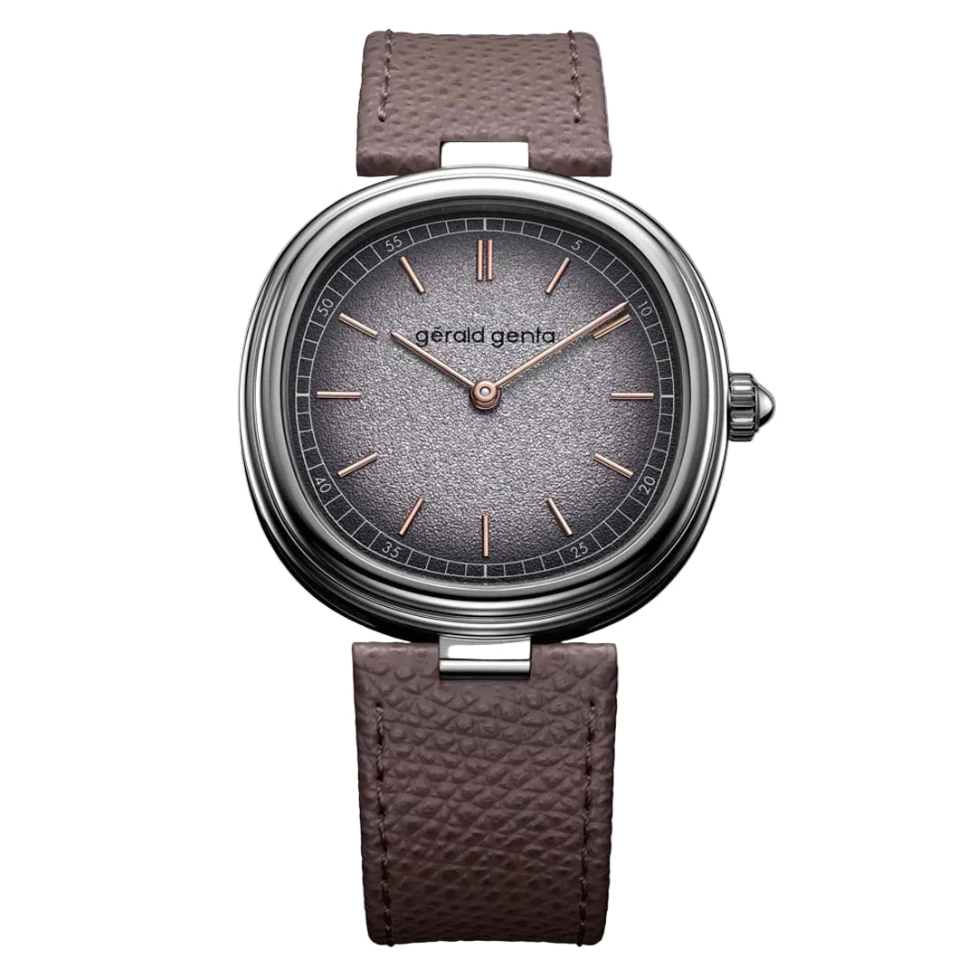 Discover the Gerald Genta Genève Time Only Grafite in white gold, featuring a silver grained dial with metallic sheen and contrasting 4N rose gold hands and indexes.