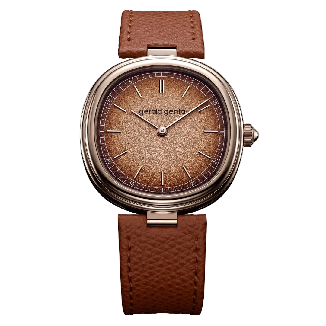Discover the Gerald Genta Genève Time Only Marrone in 4N rose gold, featuring a rich brown grained dial and refined cushion case design. Understated luxury with striking presence.