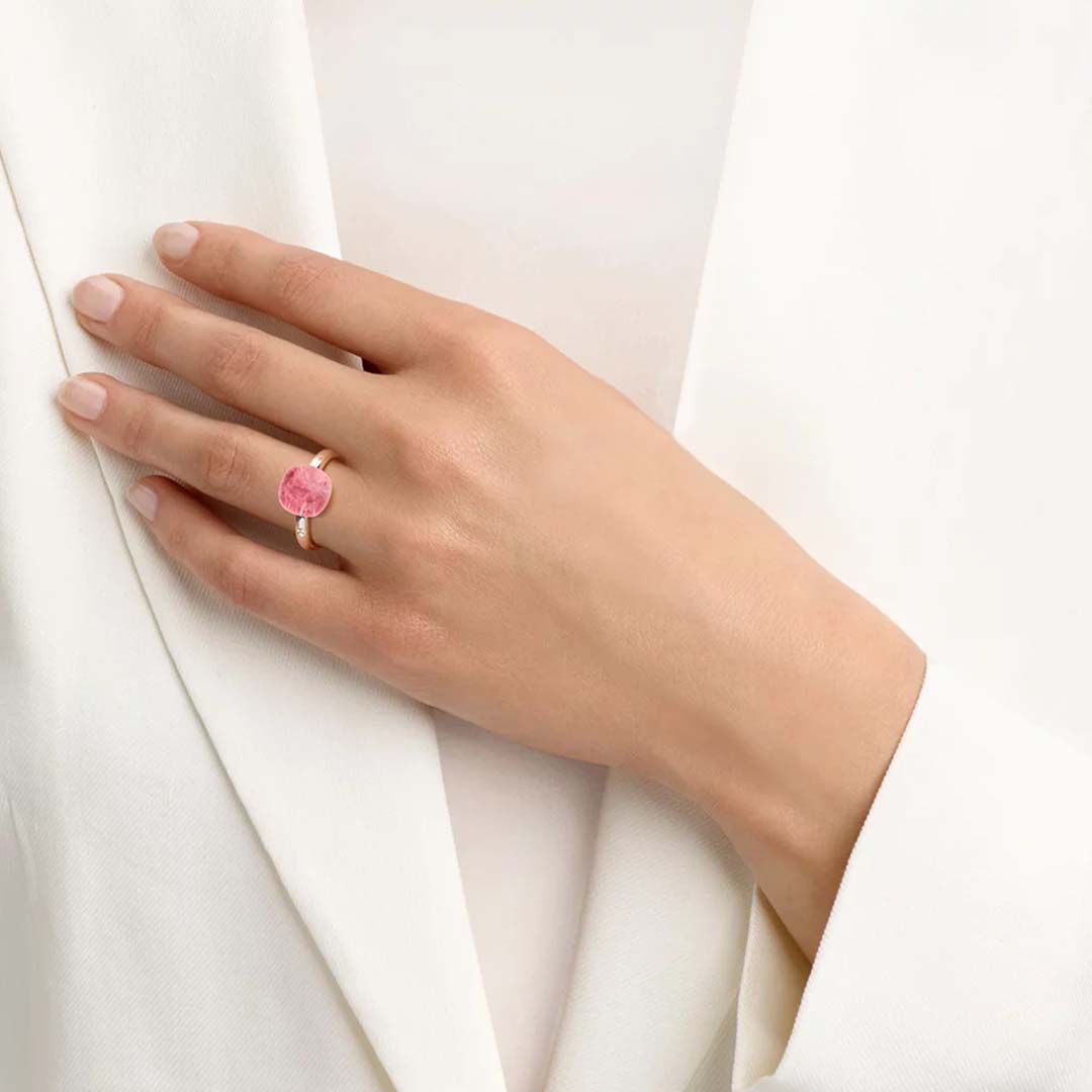 A Mini Sweety ring set with ruby and rock crystal, delivering radiant light, bold colour, and everyday luxury.