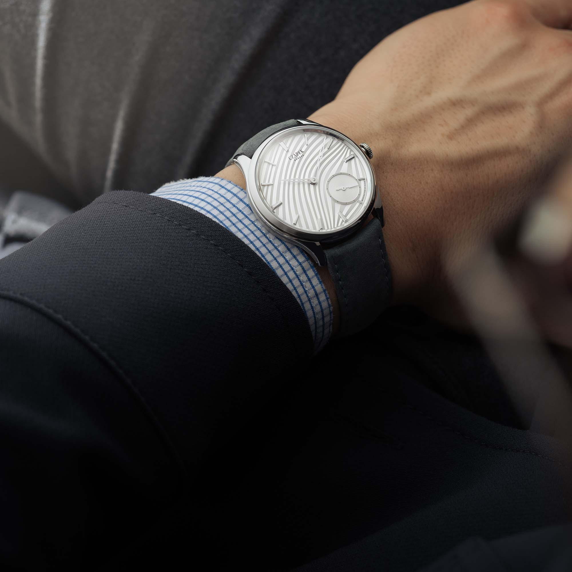 The Czapek Promenade Plissé Pearl White pairs fluid case design with a textured plissé dial. A rare limited edition of 18 watches.