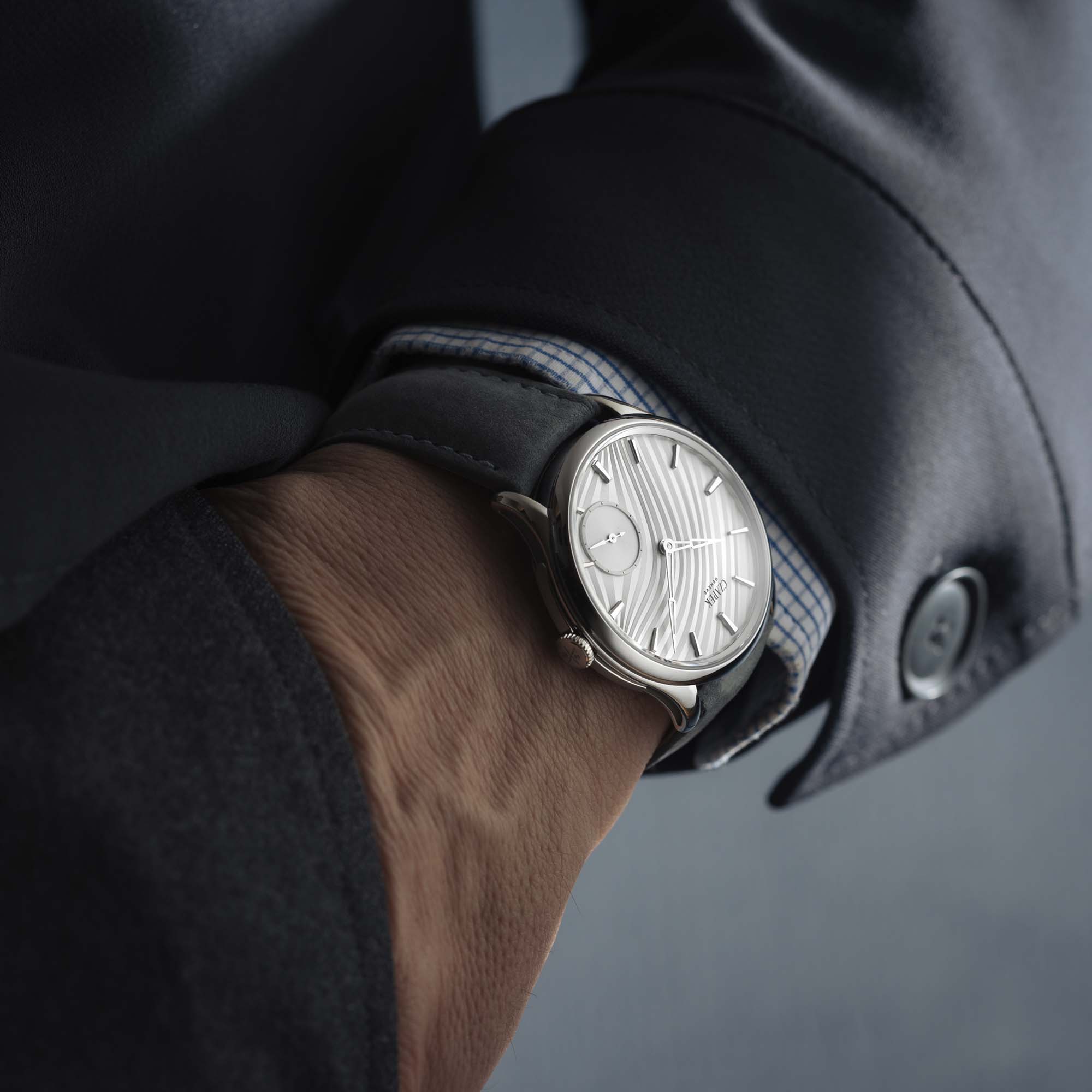 Czapek Promenade Plissé Pearl White features a luminous pleated dial, automatic movement, and understated elegance. Limited to 18 pieces.