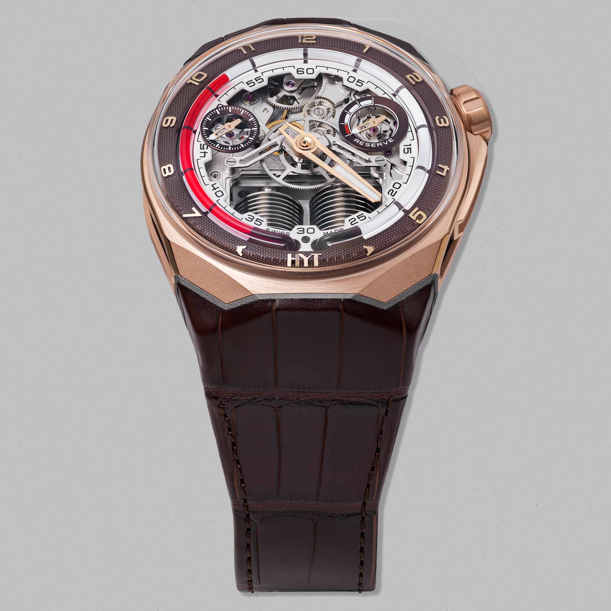 Limited to just 8 pieces, the HYT S1 5N Gold Titanium Cigare pairs 5N gold accents with titanium construction and HYT’s signature fluid time indication.