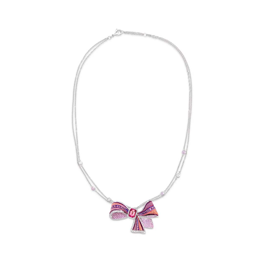 Discover the SICIS Jewels Pink Ribbon Necklace, a handcrafted micromosaic masterpiece blending 18th-century Italian artistry with modern elegance. A unique expression of colour, craftsmanship, and femininity.