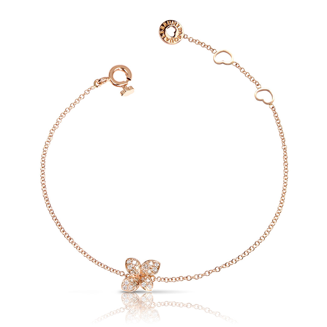 The Petit Garden Bracelet in 18K rose gold features a delicate petite flower motif set with brilliant diamonds. A refined expression of elegance and everyday luxury.