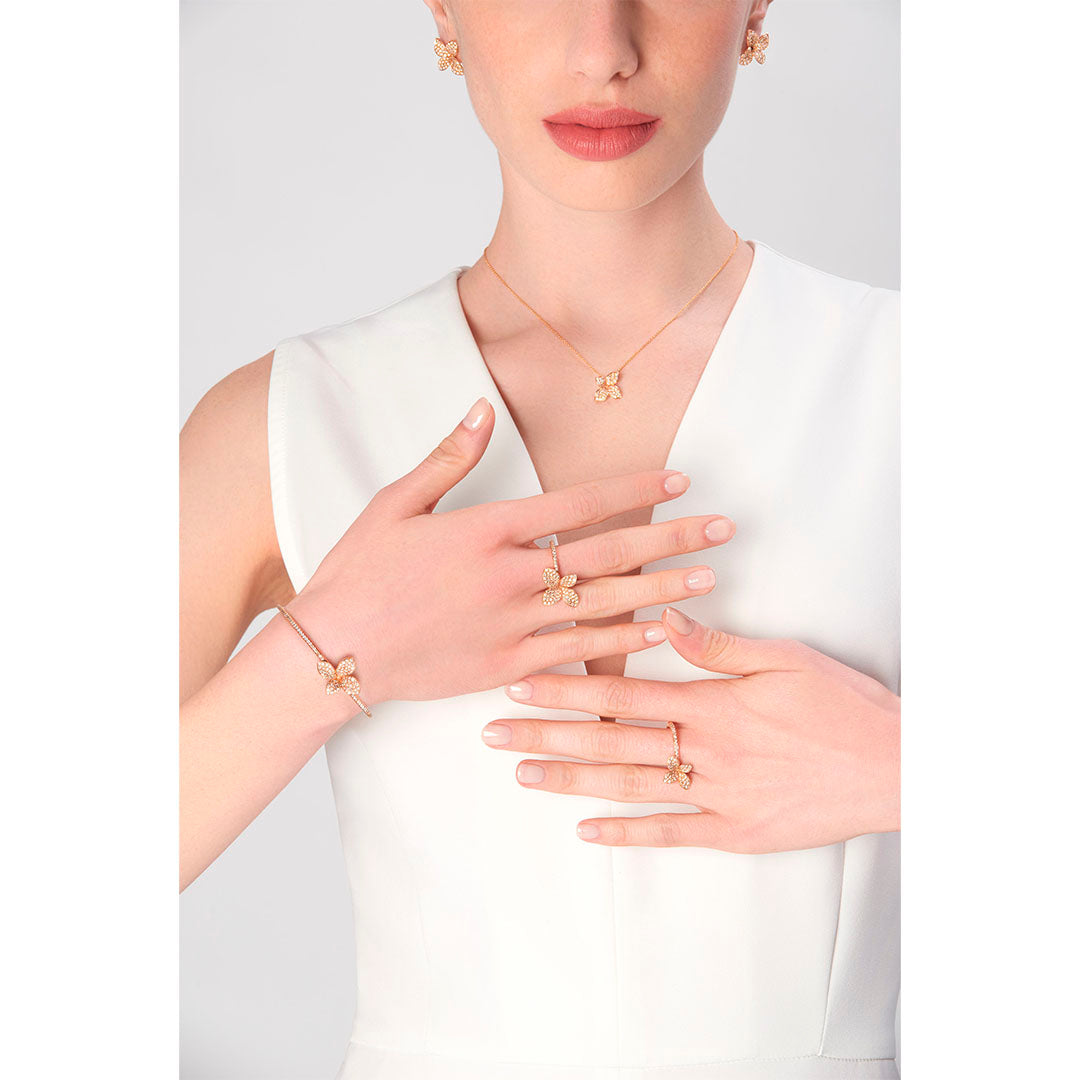 The Petit Garden Ring 18K rose gold with white and champagne diamonds offers delicate brilliance and romantic tones, crafted for timeless luxury. SKU 16801R.
