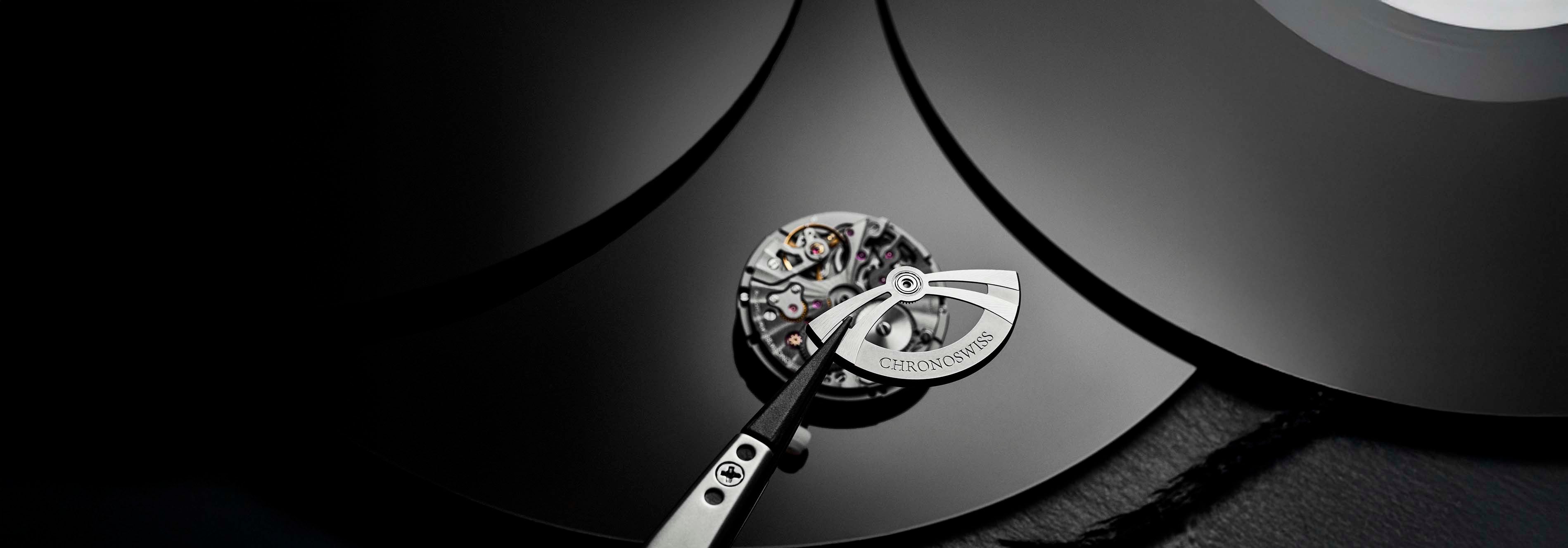 Chronoswiss Neo Digiteur Granit, a mechanical watch without hands featuring jumping hours and digital minutes. Limited to 99 pieces.