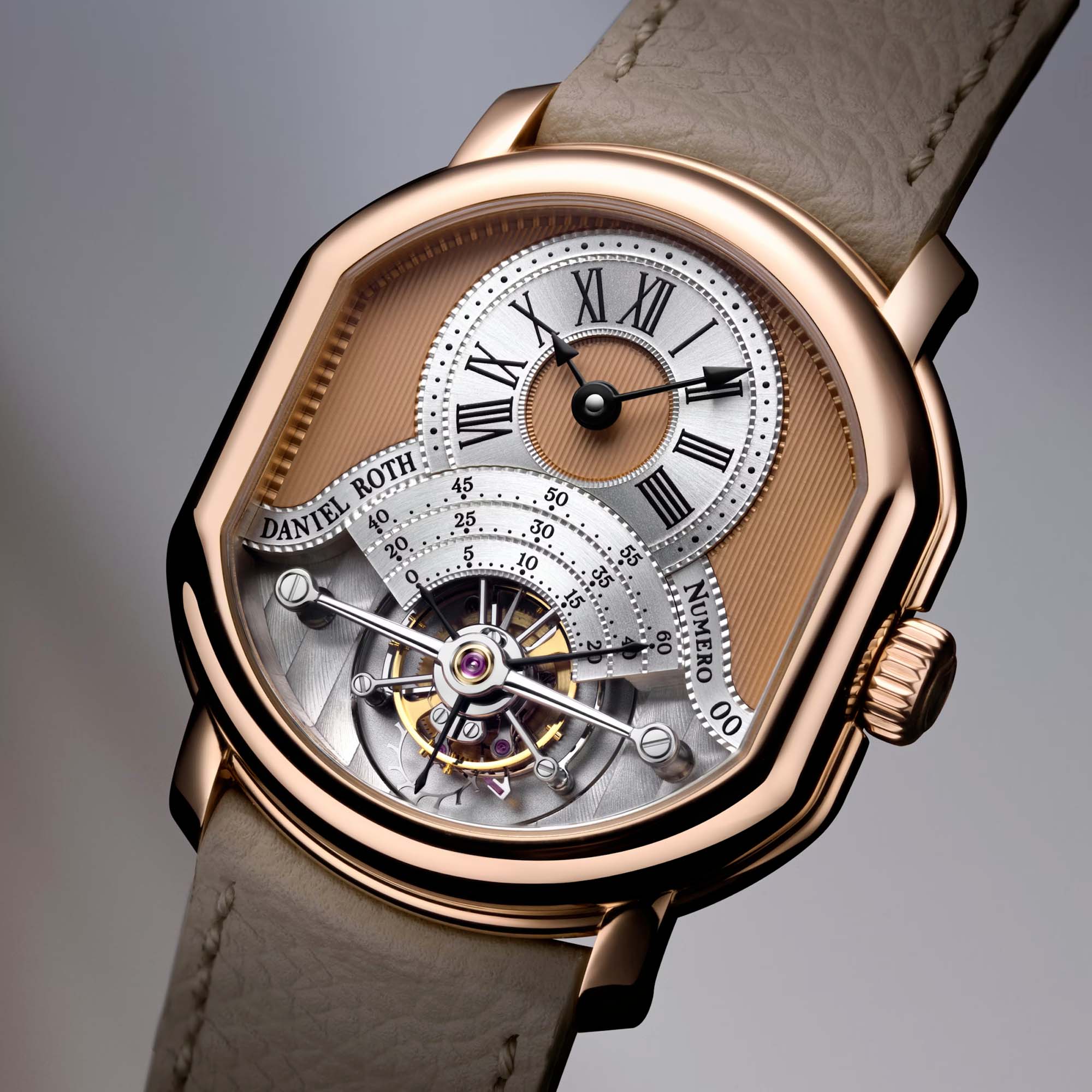 The Daniel Roth Tourbillon Rose Gold features a rose gold pinstriped dial, 925 silver elements and an open case back revealing the hand finished DR001 movement.