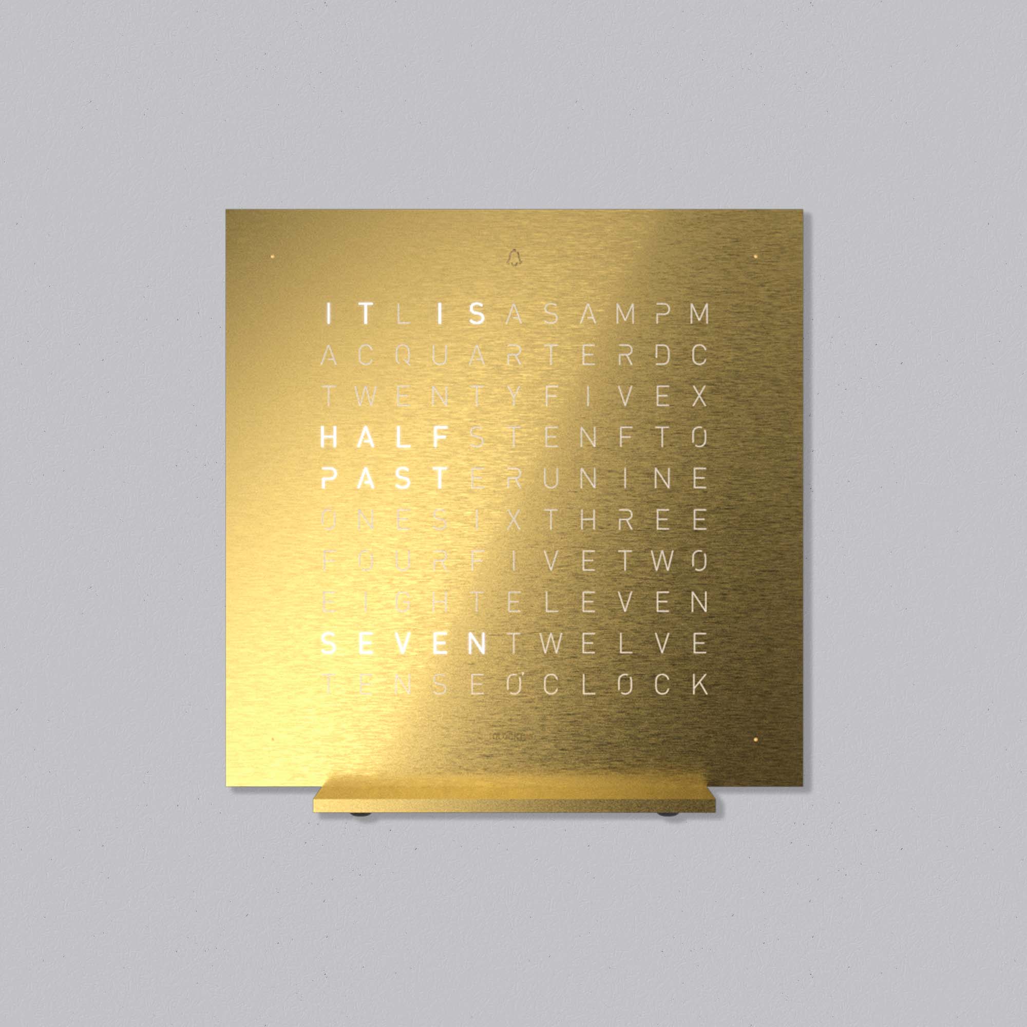 QLOCKTWO EARTH 13.5 Golden Legend with a solid gold front panel. A refined sculptural time display that blends contemporary design with precious material.