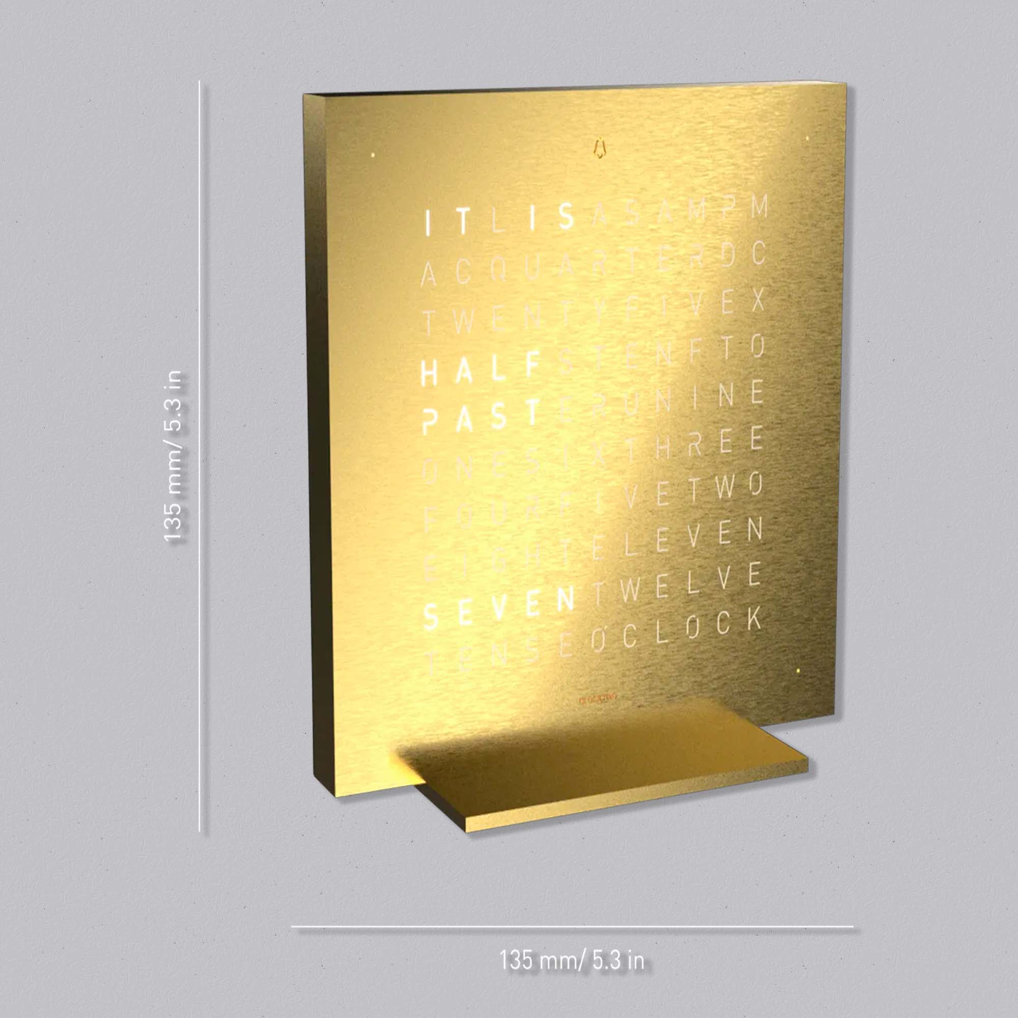 The QLOCKTWO EARTH 13.5 Golden Legend presents time in words, crafted with a solid gold surface for a quiet expression of modern horology and design.