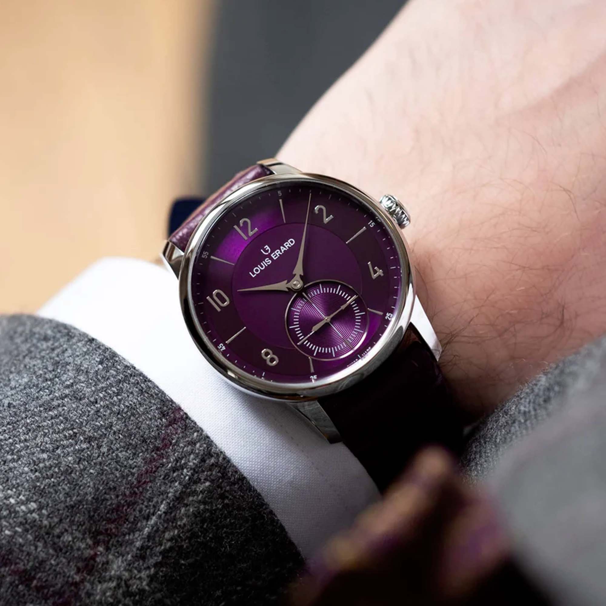 The Louis Erard Petite Seconde Violette stands out with its radiant purple dial and classic small seconds design, crafted with Swiss precision.