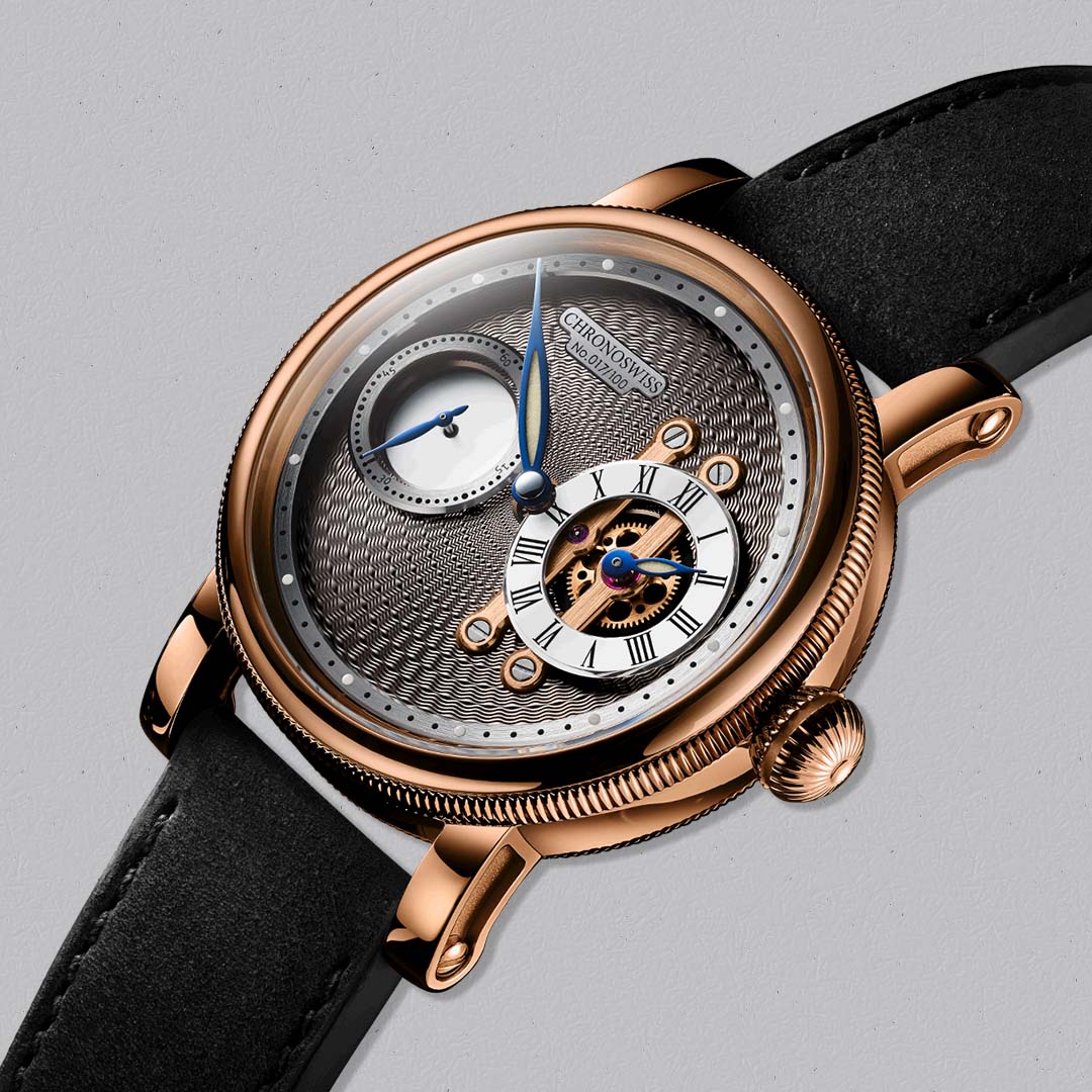 The Evolution Strike II Nugget by Chronoswiss pairs solid red gold with exposed mechanics and a refined horizontal regulator display.