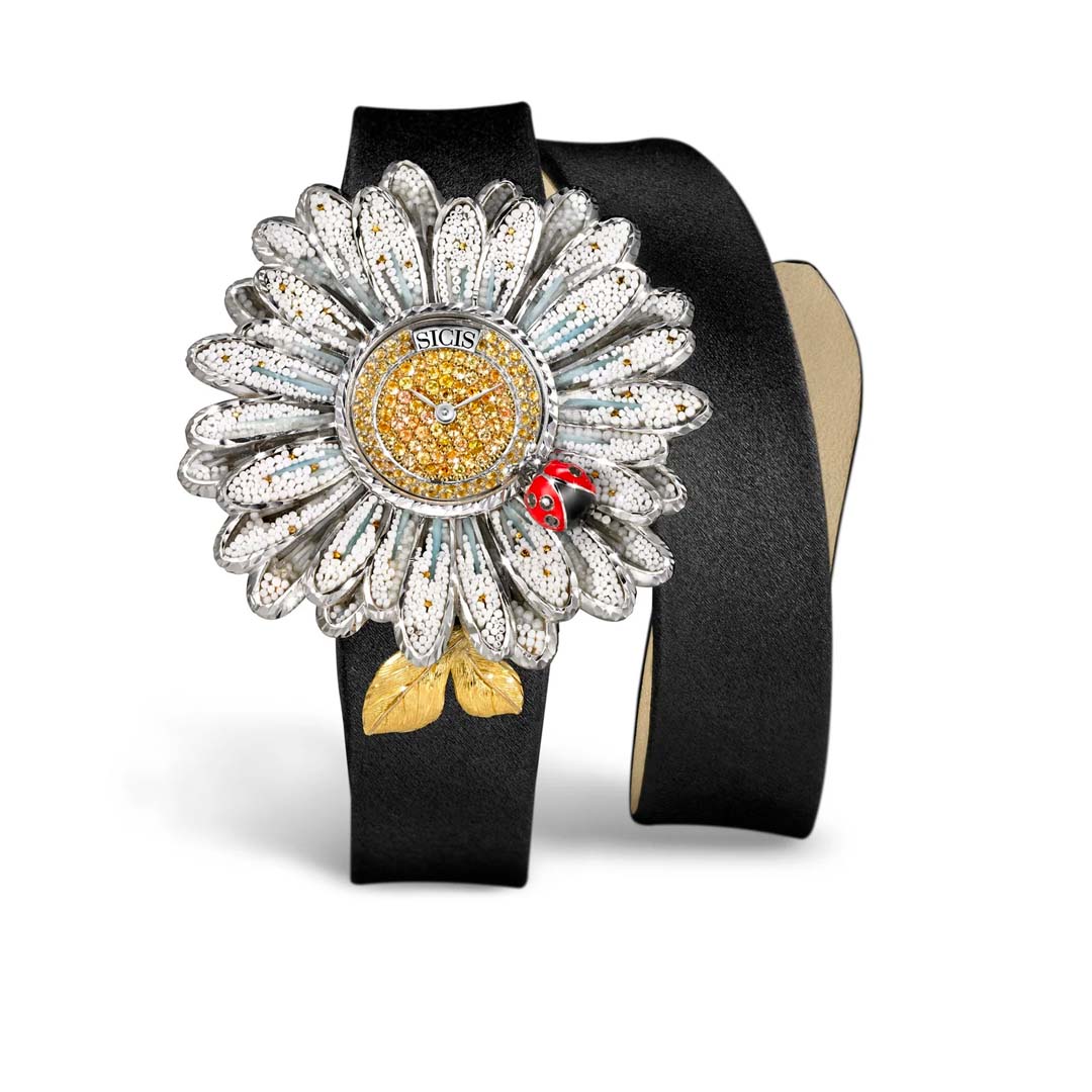 The Sicis White Daisy Watch captures nature in motion with a hand-set micromosaic daisy, framed by black diamonds and yellow sapphires. A rare union of jewellery and horology.