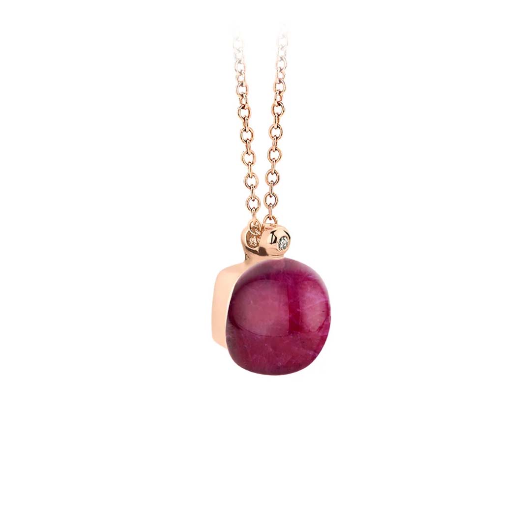 Discover the Mini Sweety pendant featuring amethyst and ruby, a striking blend of vibrant gemstones and timeless design.