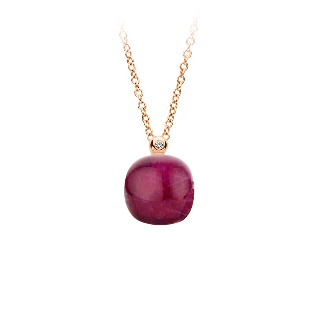 The Mini Sweety pendant with amethyst and ruby brings rich colour and refined elegance to a contemporary jewellery classic.