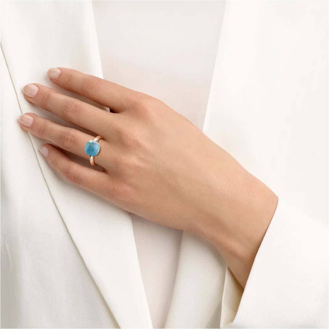 A Mini Sweety ring set with dark apatite and rock crystal, delivering rich tones, radiant light, and everyday luxury.