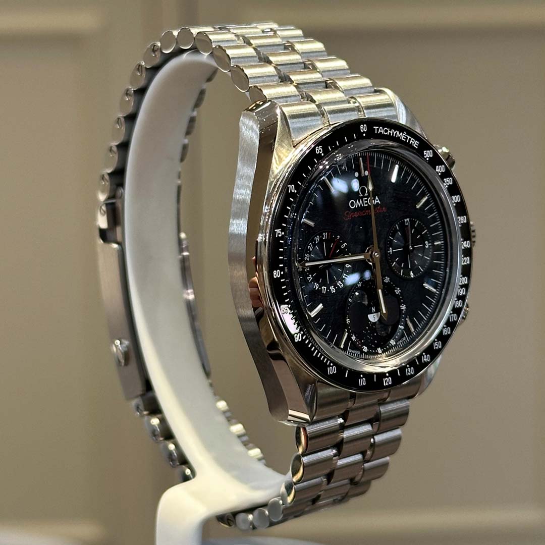 Own a pre-owned Speedmaster Moonphase with genuine lunar meteorite moons, ceramic tachymeter bezel, and manual chronograph movement.