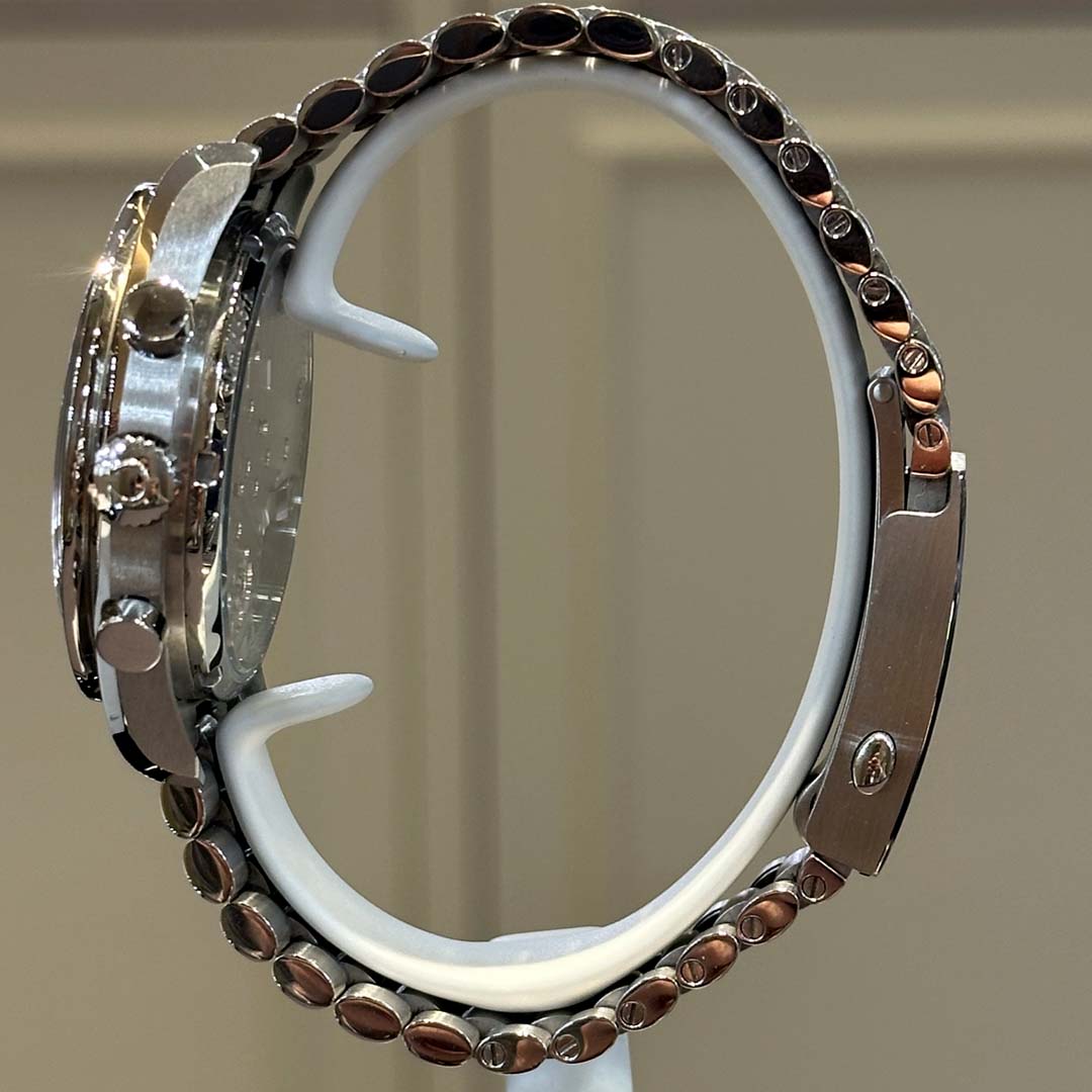 A rare pre-owned Speedmaster Moonphase with black meteorite dial, white gold details, and METAS certified Co-Axial calibre.