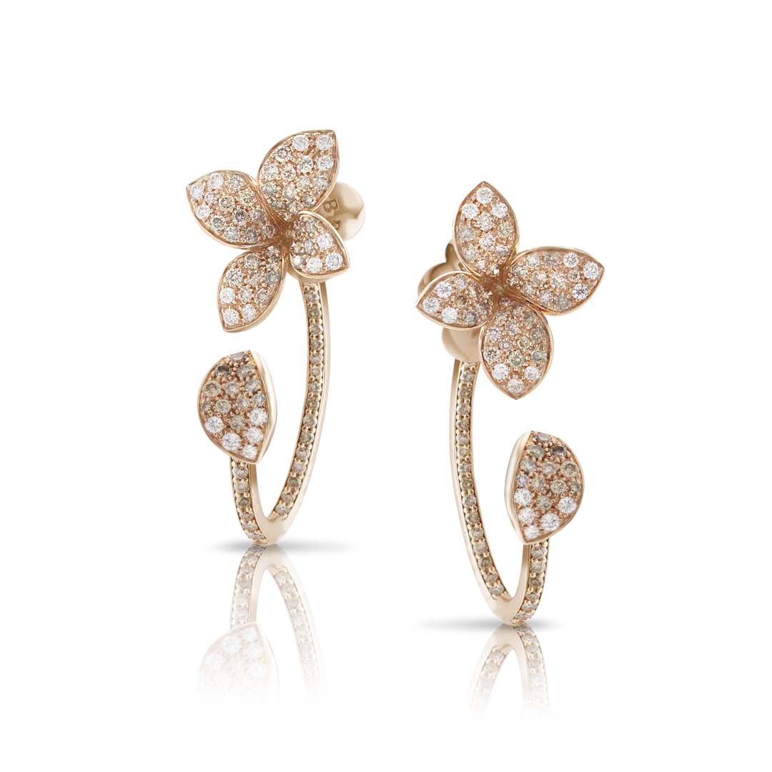 Rose gold flower-shaped earrings with diamond accents on a white background