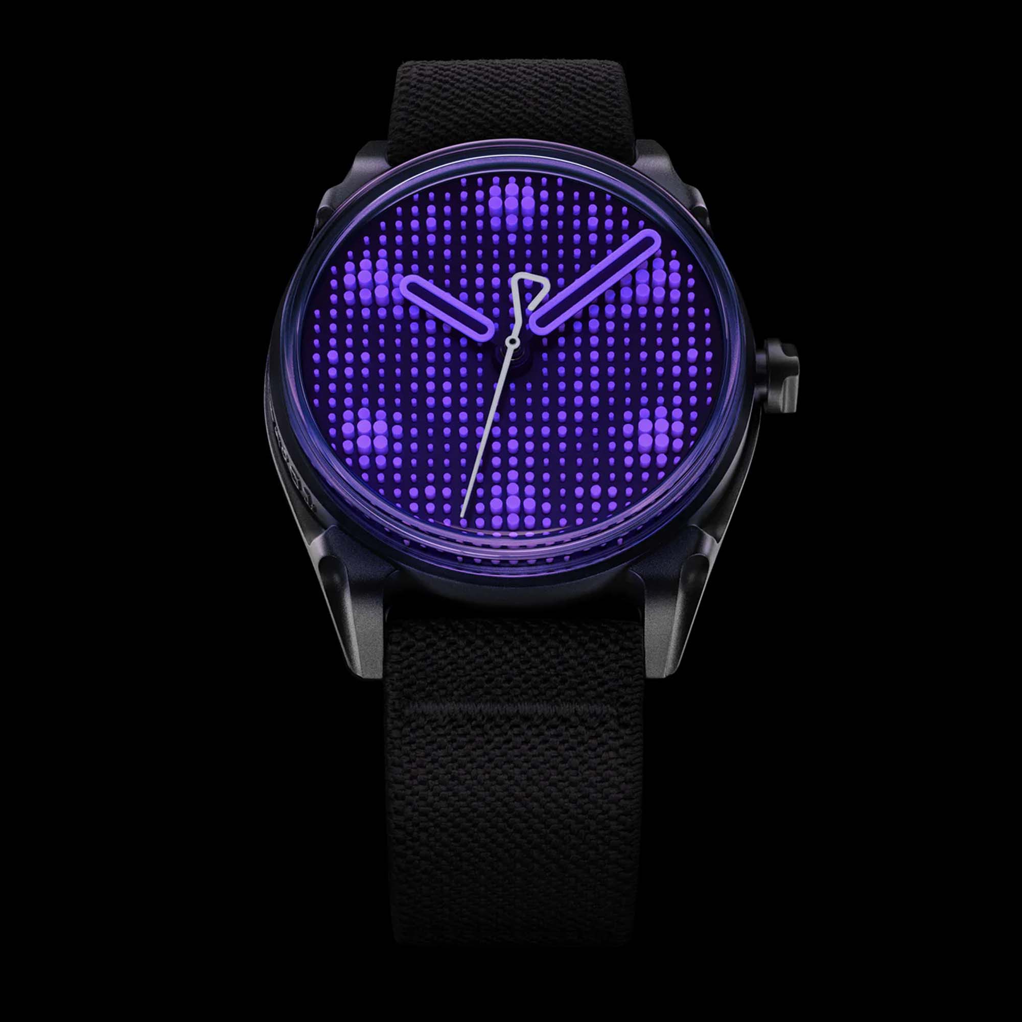 The Kollokium Projekt 01 Variant F redefines luminous design with violet Super Luminova Lichtblock material and a raw die cast steel case, limited to 399 pieces.