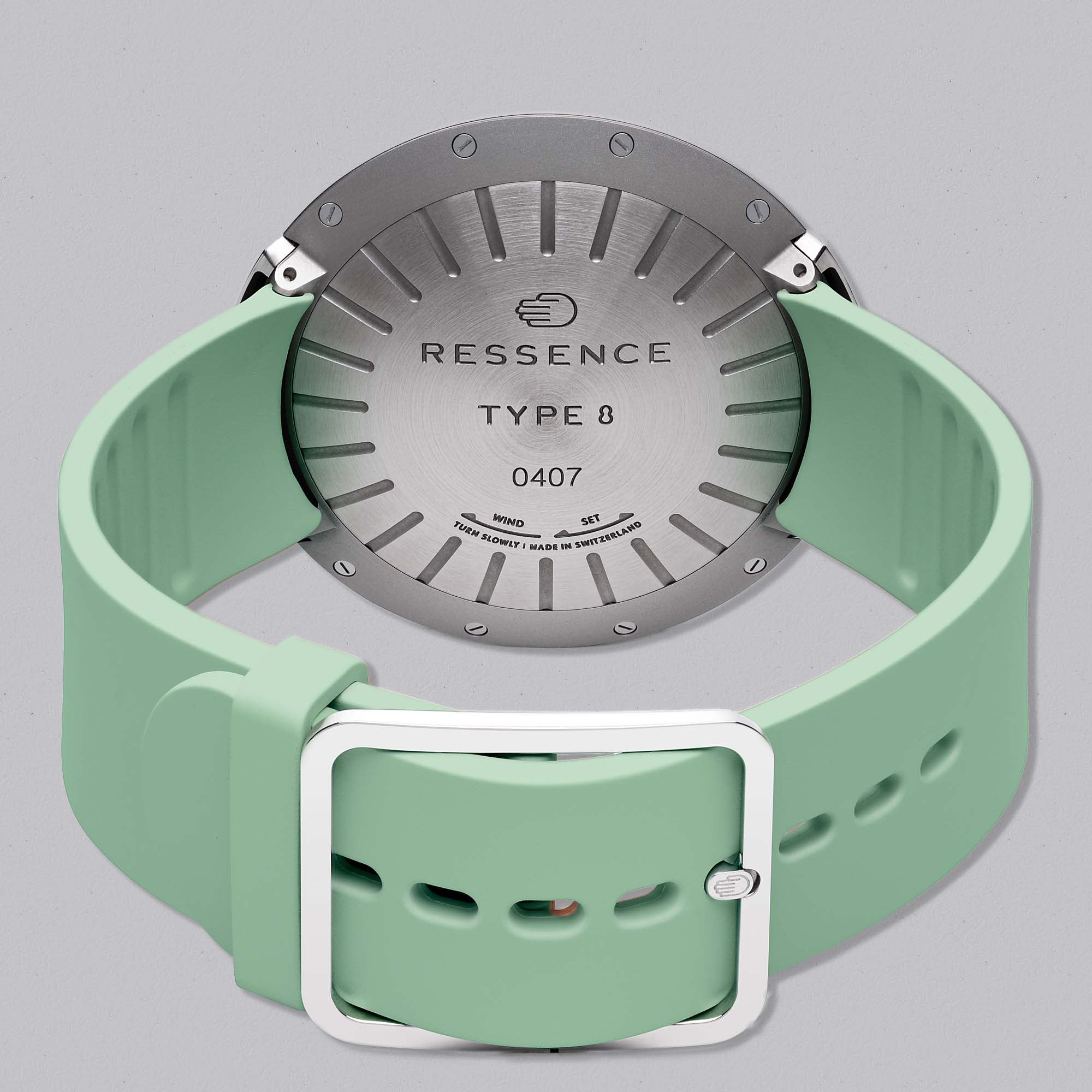 The Type 8 DE2 Turquoise by Ressence reimagines minimalism with a vivid dial, rotating discs, and signature titanium design.