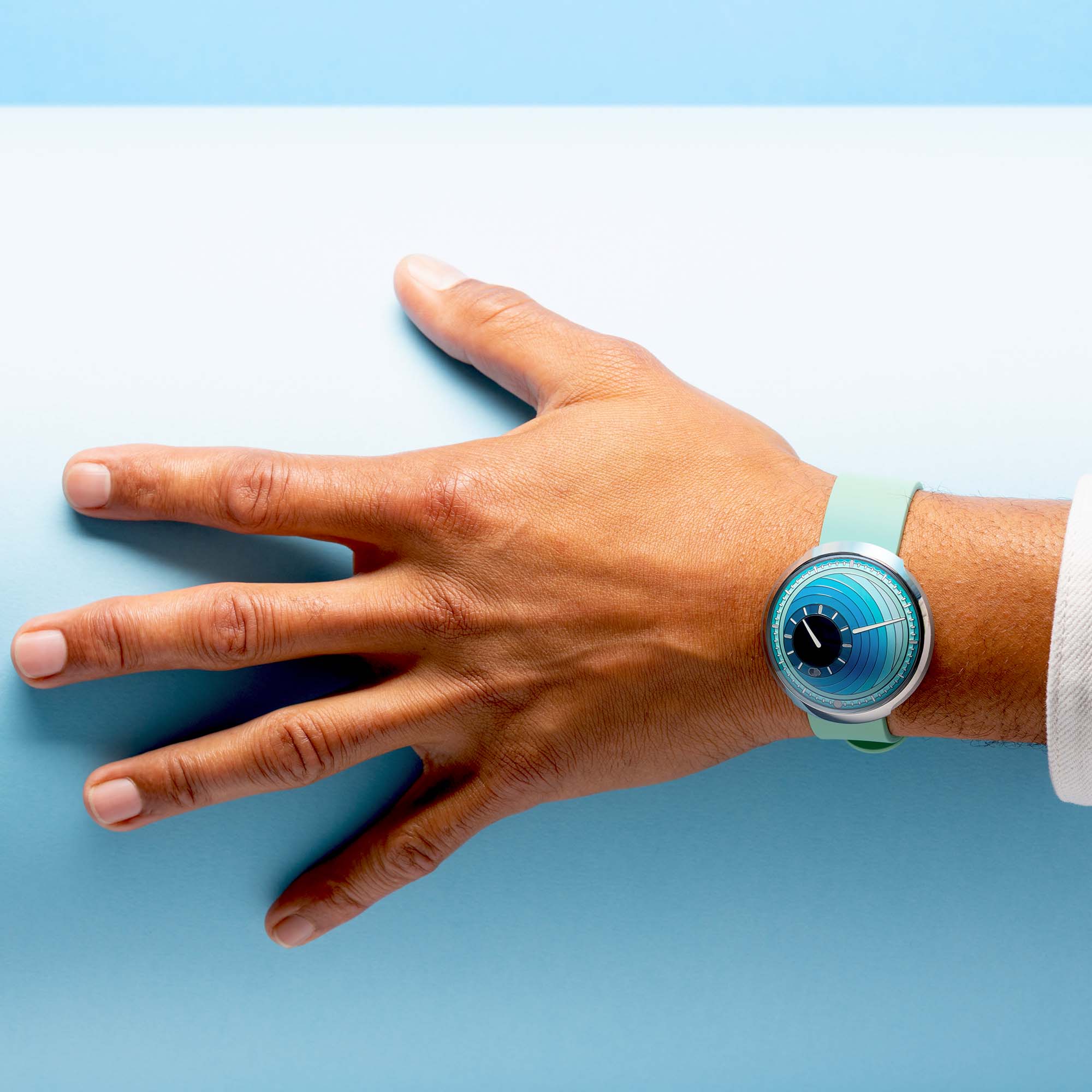 Ressence DE2 Turquoise combines futuristic horology with soothing color — an ultra-light mechanical watch with orbital hours and minutes.