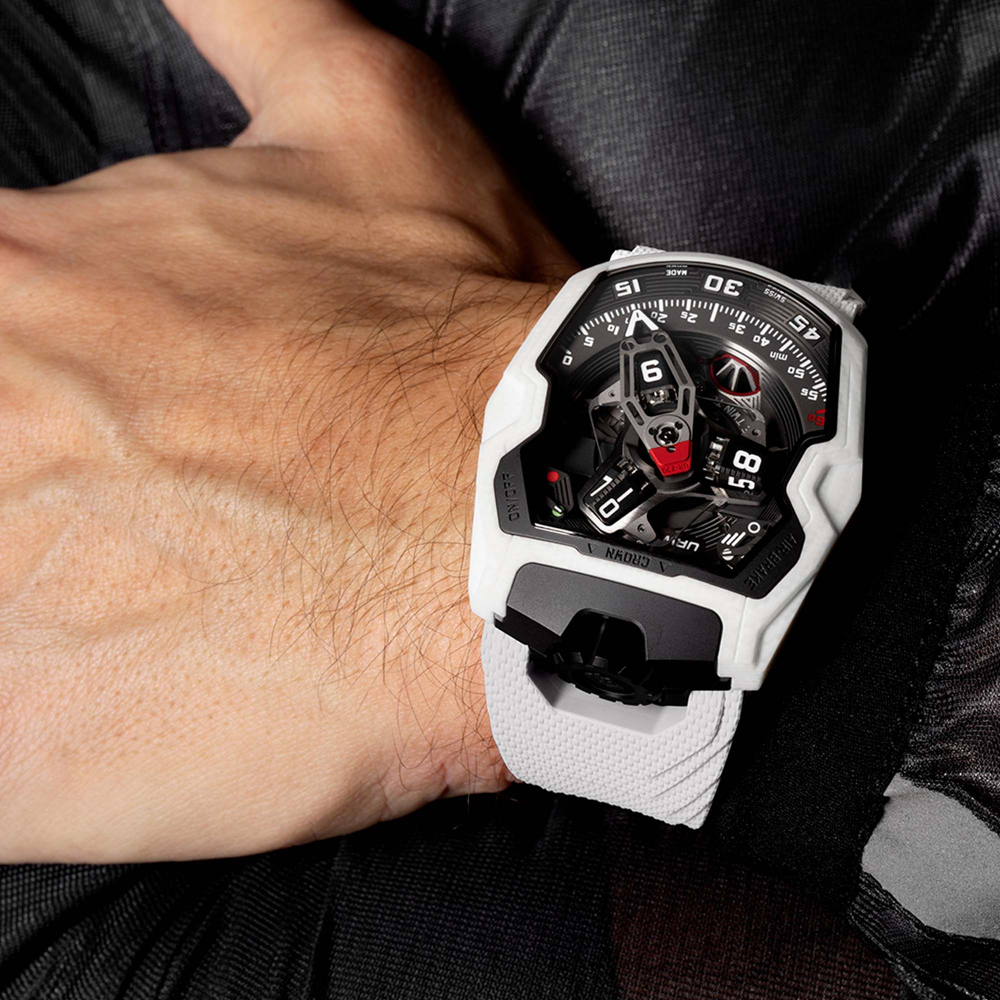 Limited edition URWERK UR-230 Polaris featuring the UR-7.30 calibre, wandering hour satellites and a proprietary layered ceramic case engineered with fibreglass.