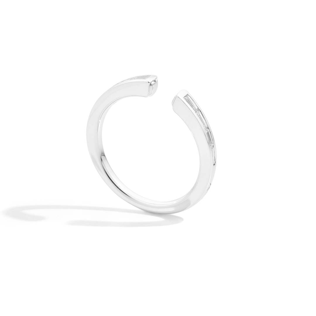 Elegant tapered baguette diamonds elevate this Recarlo White Gold Half Eternity Ring, crafted with timeless precision and contemporary Italian style.