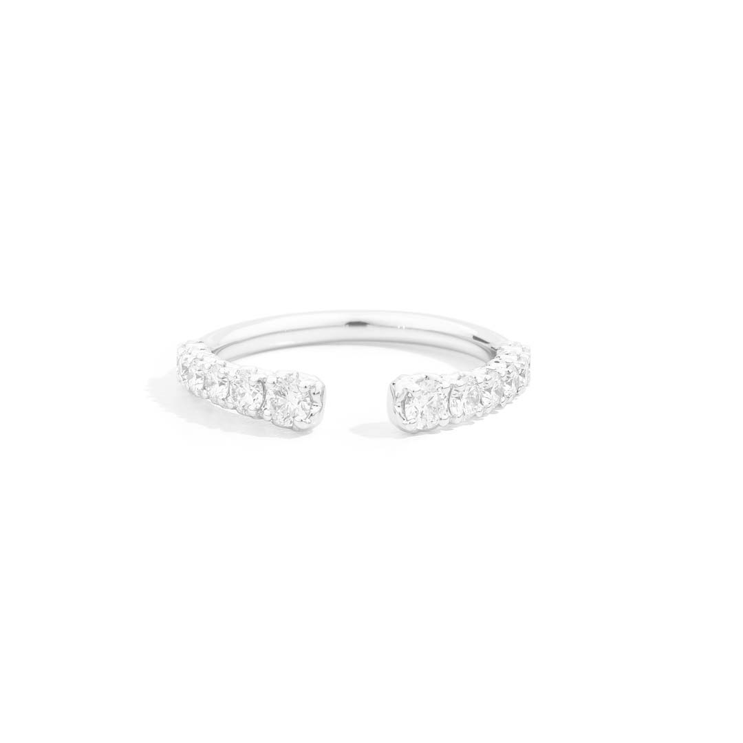 Discover the ANNIVERSARY MORE white gold half eternity ring, refined diamonds set in luminous white gold, a timeless symbol of love and modern elegance.